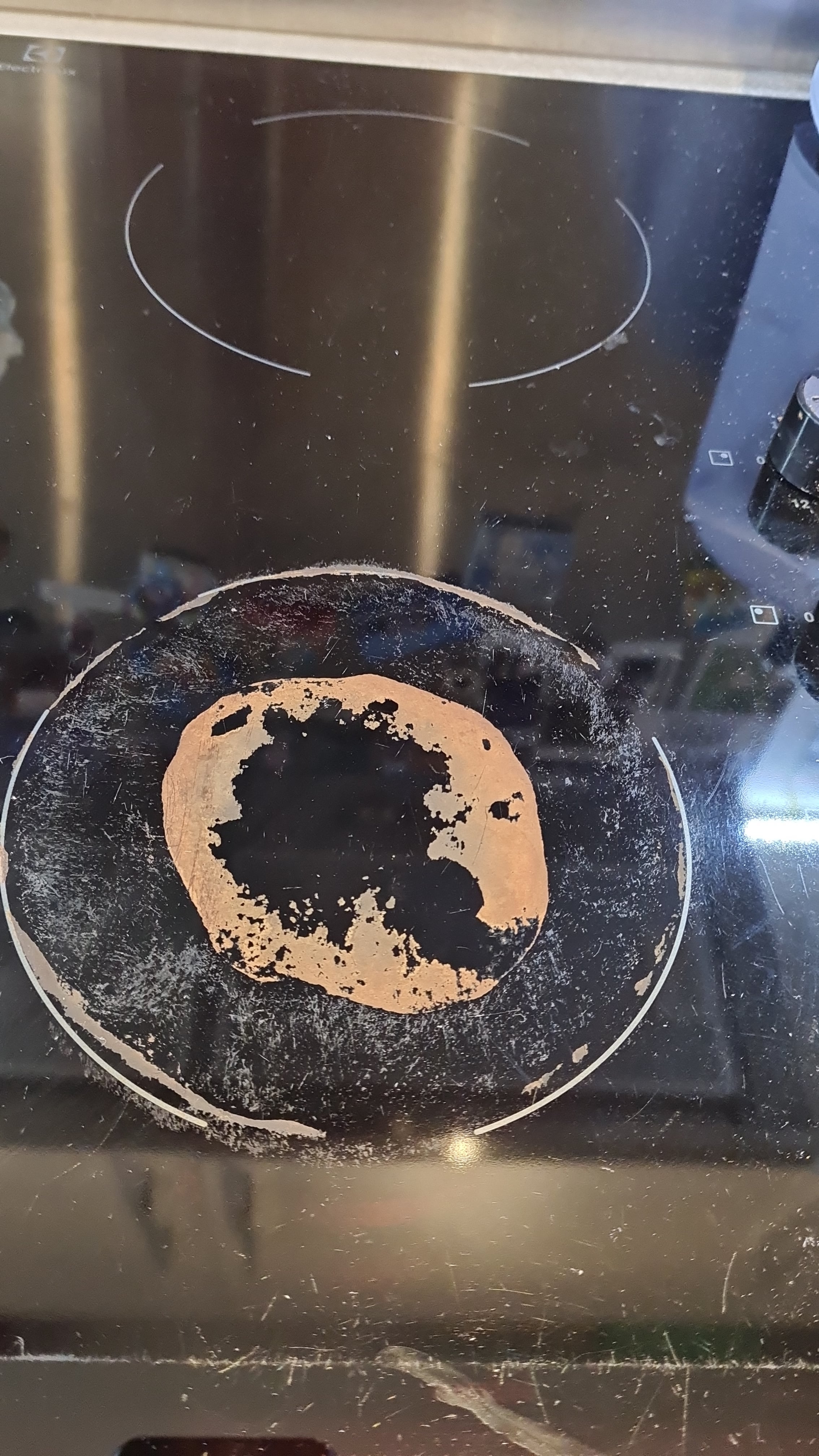 How to Clean Burnt Milk From a Glass Stovetop?